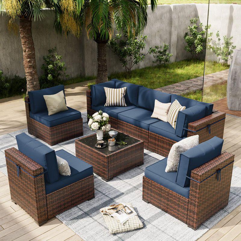 7 Piece Rattan Sectional Seating Group with Cushions, (Wayfair).