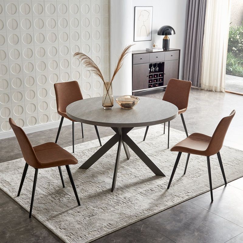 “47.2’’ round dining table set with modern design, steel legs, and seating for 4-6 people. Includes 1 table and 4 chairs. Professional assembly service available.”