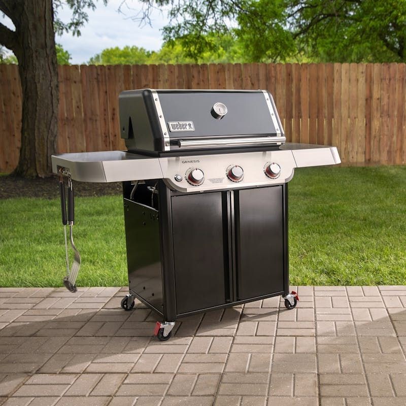 “Weber Genesis E-315 Gas Grill expertly assembled and installed outdoors”