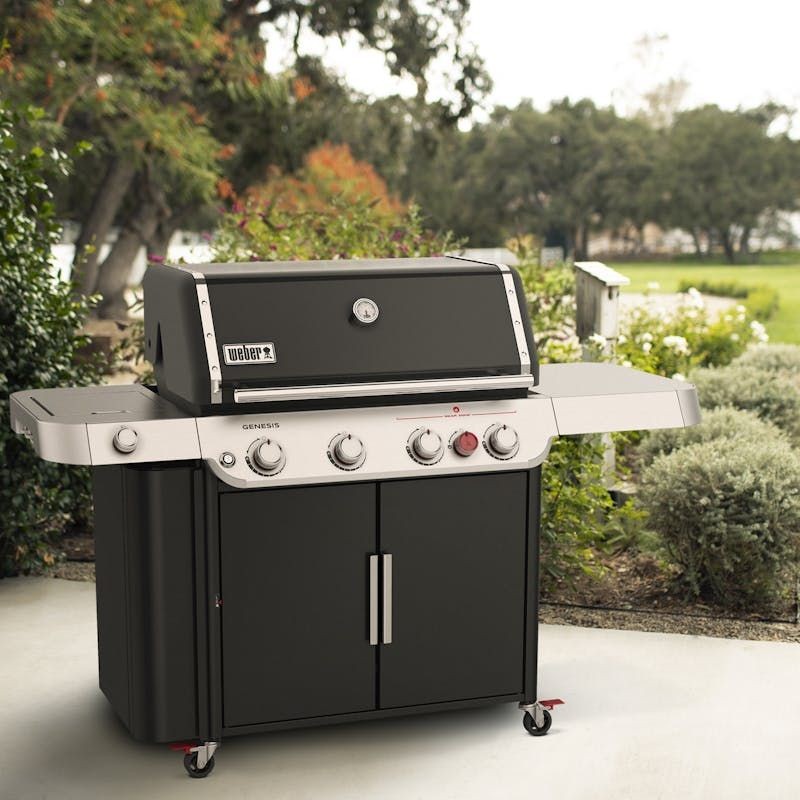 “Weber Genesis E-435 Gas Grill expertly assembled and installed outdoors”